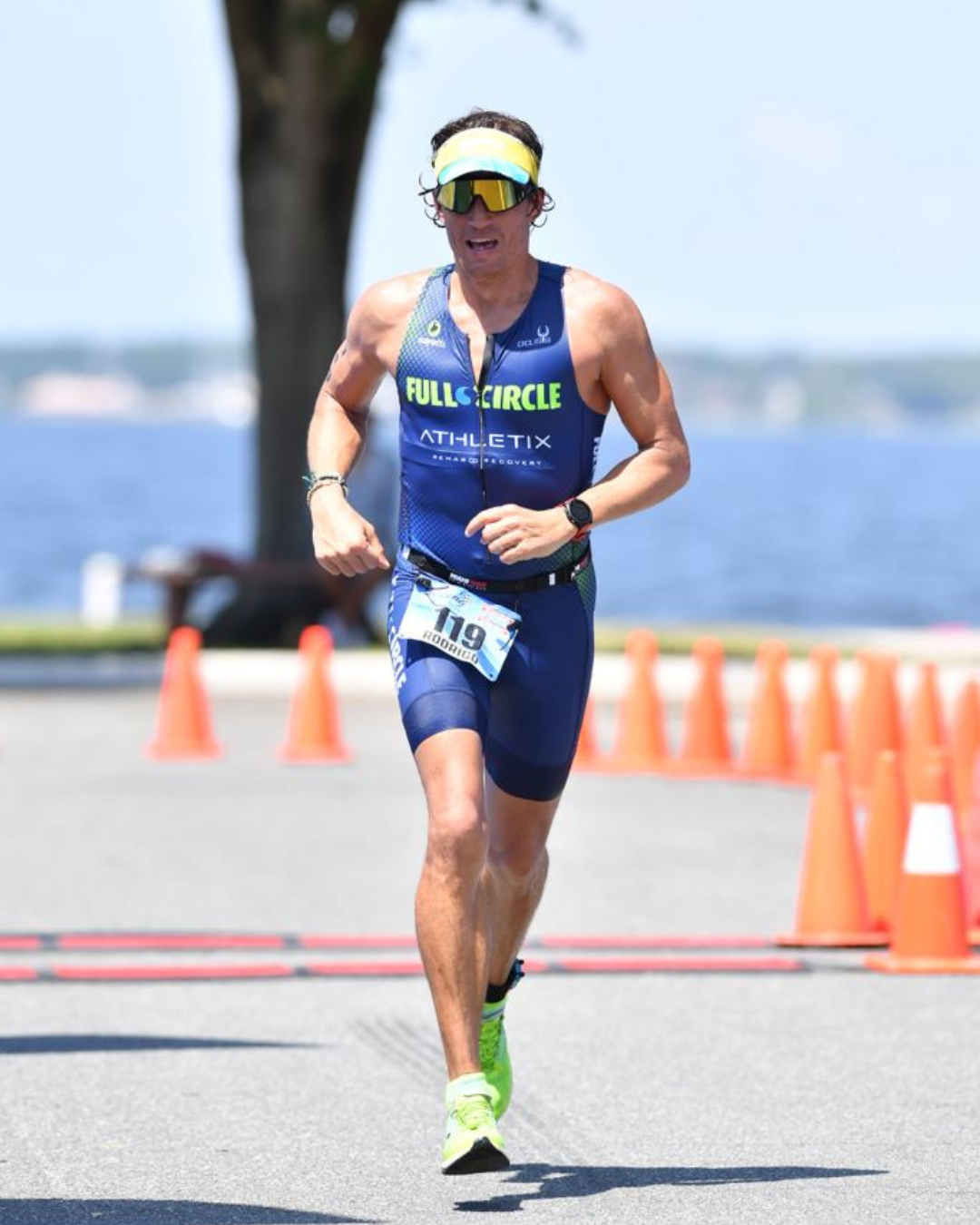 Triathlete running on a course